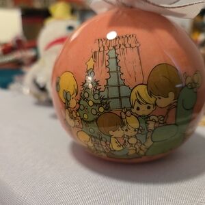 Vintage 1995 Enesco Precious Moments Christmas Ornament with Family Scene.